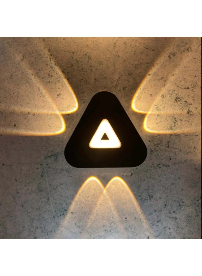 Modern black wall sconce (warm lighting) in the shape of a triangle - Image 3
