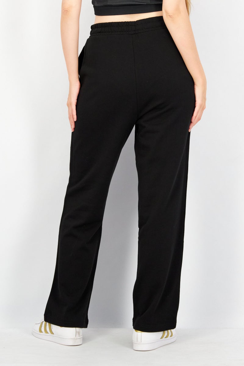 PUMA Women Sportswear Fit Wide Leg Brand Logo Sweatpants, Black - Image 2