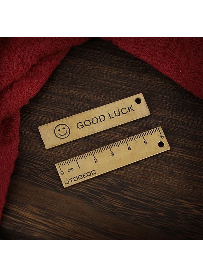 مسطرة صغيرة محمولة محفورة من النحاس العتيق لقياس الوجه المبتسم المحظوظ - Image 2