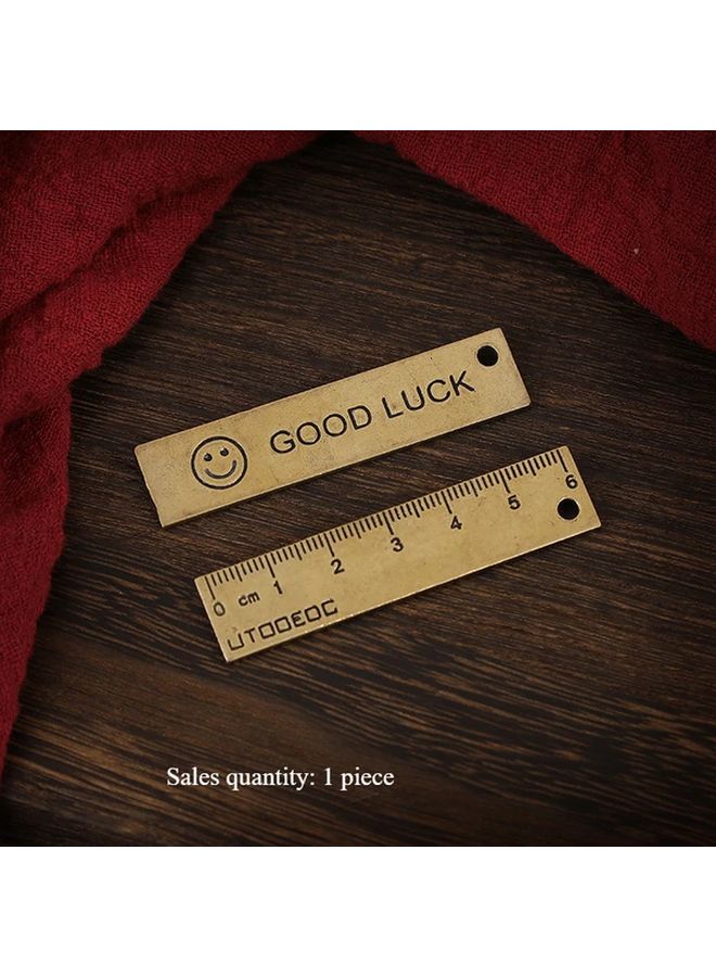 مسطرة صغيرة محمولة محفورة من النحاس العتيق لقياس الوجه المبتسم المحظوظ - Image 1