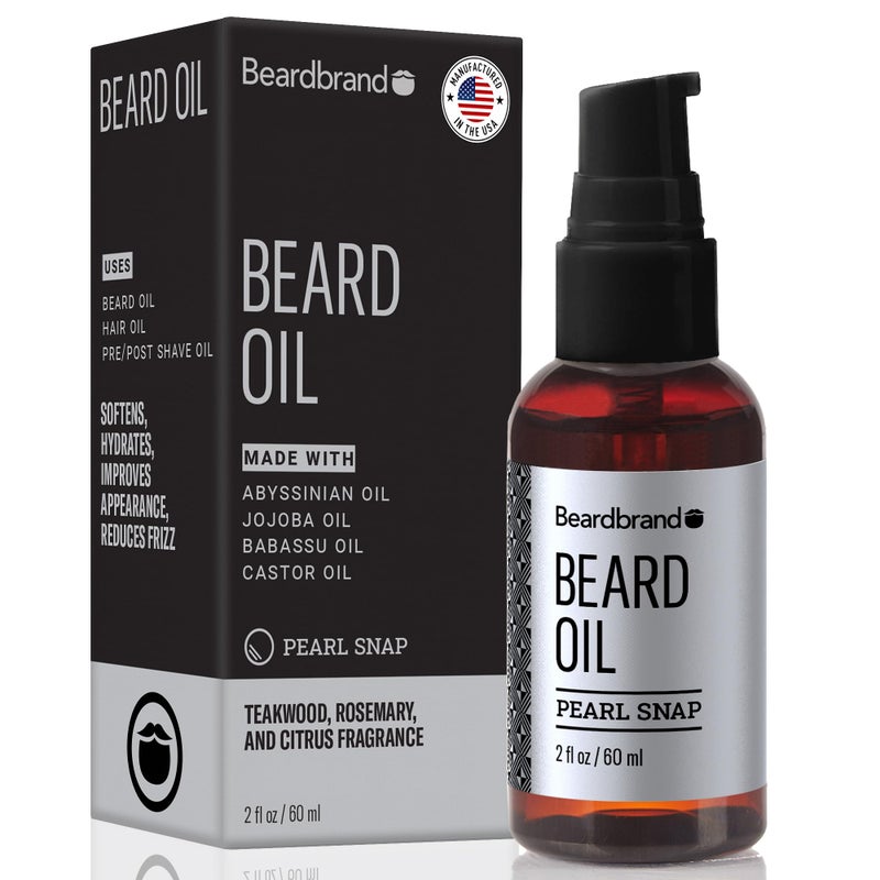 Beardbrand زيت لحية من بيردبراند للرجال مع زيت الجوجوبا وفيتامين E - يلين الشعر الخشن، يرطب البشرة ويعزز نمو اللحية | رائحة خشب الساج، إكليل الجبل، والحمضيات | 2 أونصة سائلة - Image 1