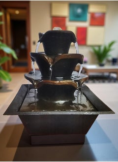 DLC An indoor illuminated water fountain with a soothing sound of flowing water adds a touch of beauty and home decor.  - Image 1