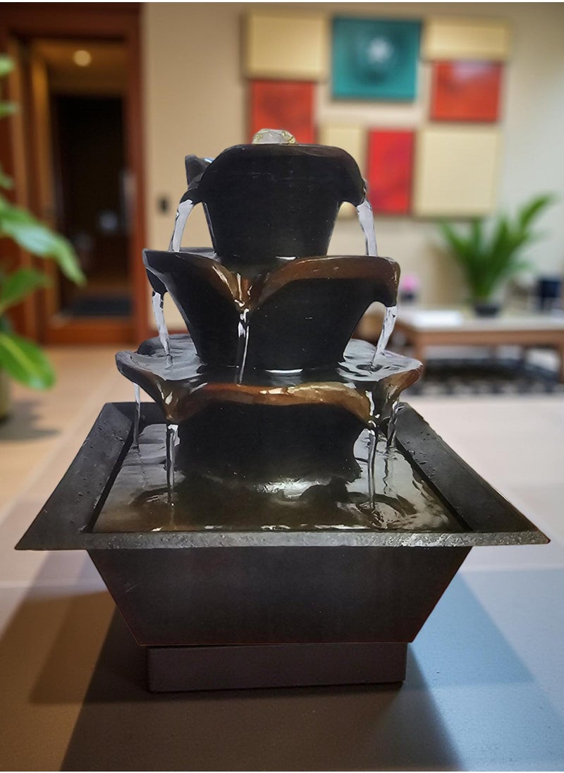 DLC An indoor illuminated water fountain with a soothing sound of flowing water adds a touch of beauty and home decor.  - Image 1