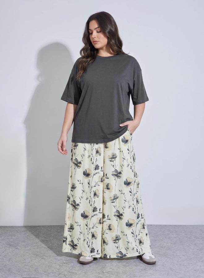 Styli Plus Size Multi-Color Solid Oversized T-Shirt and Floral Wide Leg Pants Pyjama Set - Image 1