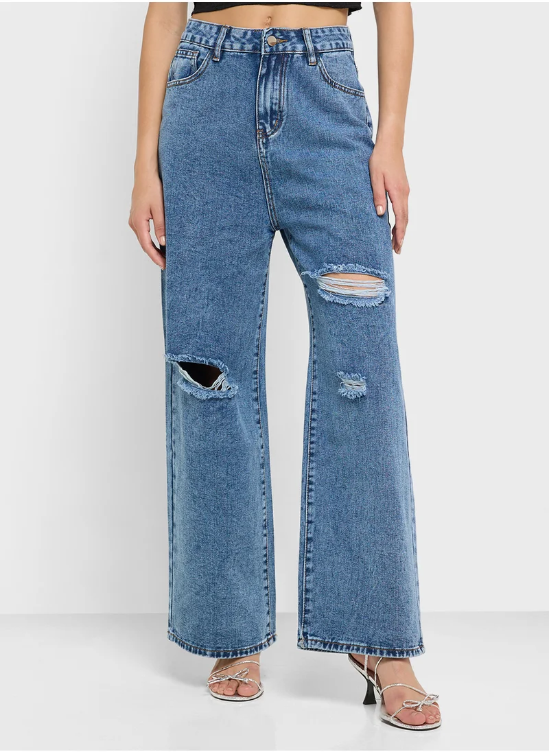 جينجر High Rise Relaxed Fit Ripped Jeans