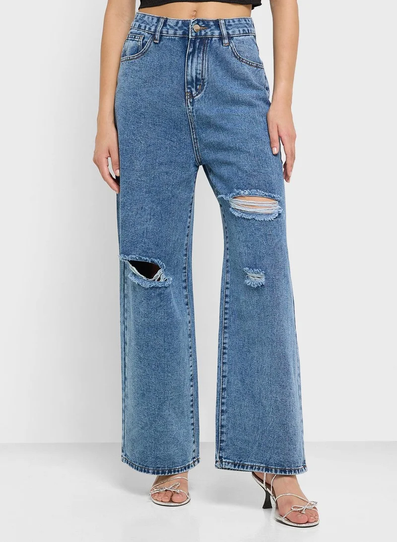 High Rise Relaxed Fit Ripped Jeans