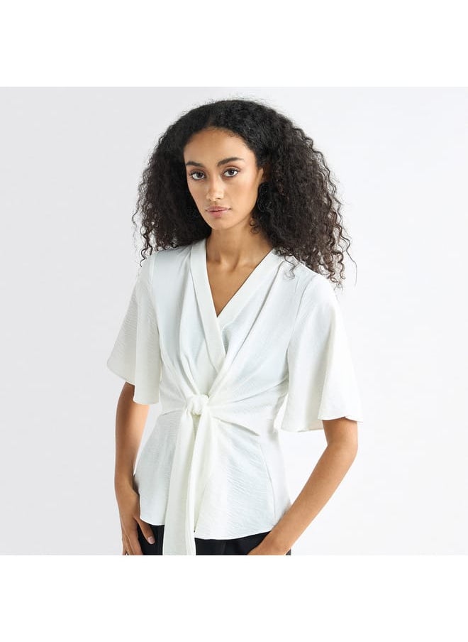 FAV Solid V-neck Top with Flutter Sleeves and Knot Detail  - Image 1