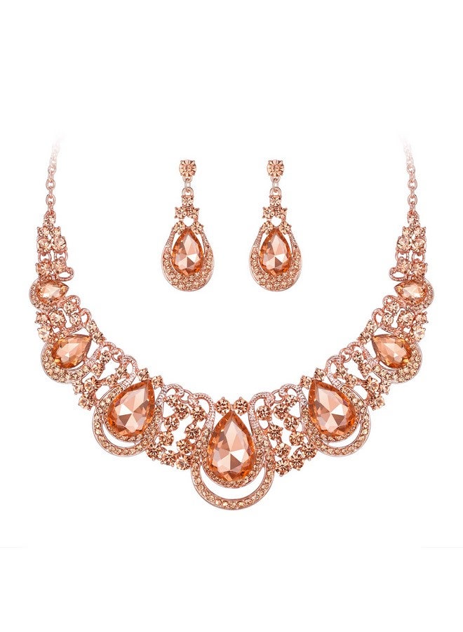 بريلوف طقم مجوهرات نسائي على الموضة مصنوع من الكريستال على شكل دمعة مجوفة مع قلادة متدلية وأقراط بلون الخوخ والذهب الوردي - Image 1