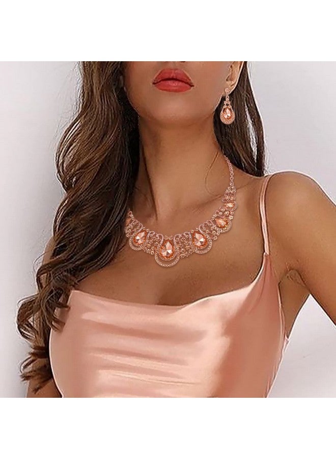 بريلوف طقم مجوهرات نسائي على الموضة مصنوع من الكريستال على شكل دمعة مجوفة مع قلادة متدلية وأقراط بلون الخوخ والذهب الوردي - Image 2