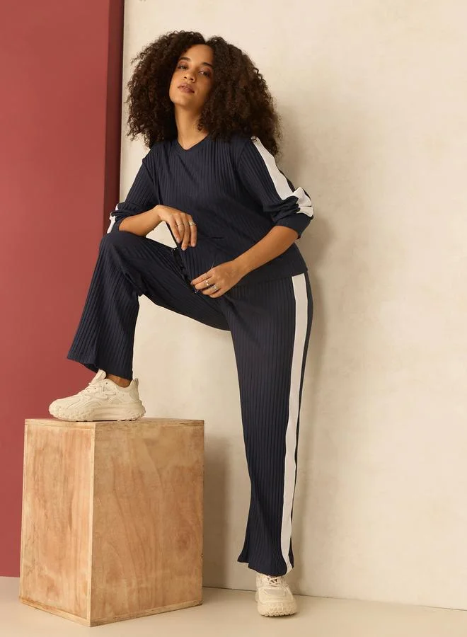 أوجيدر طقم منسق من بنطال وبلوزة مضلعة بتفاصيل مُتباينة