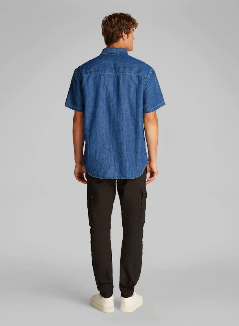 Calvin Klein Jeans Denim Medium Regular Short Sleeve Denim Shirt for Men | Best Price UAE
