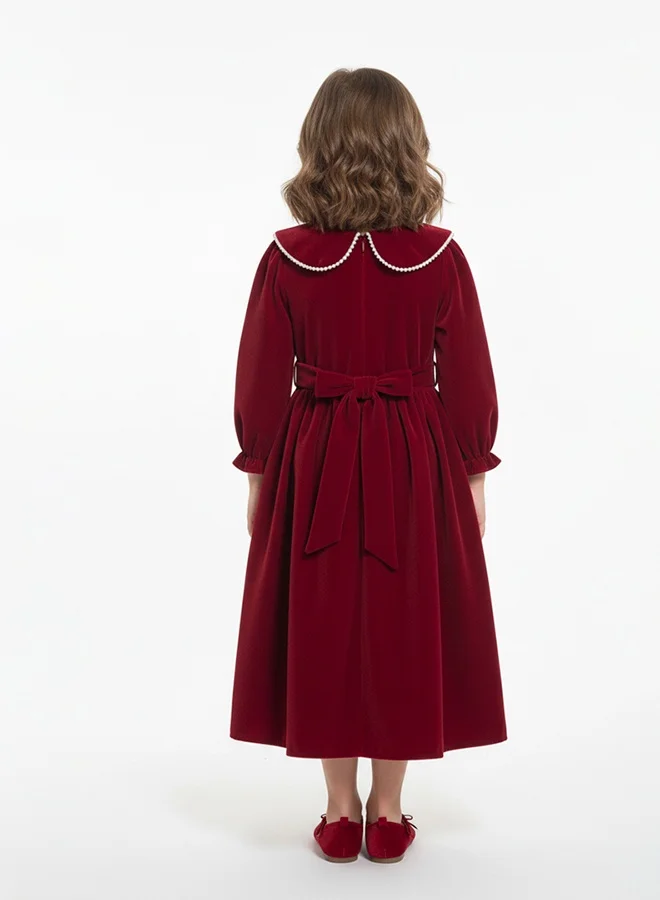 HAWRAA ABAYA Girls’ velvet dress in burgundy with a pearl-embellished collar and back belt