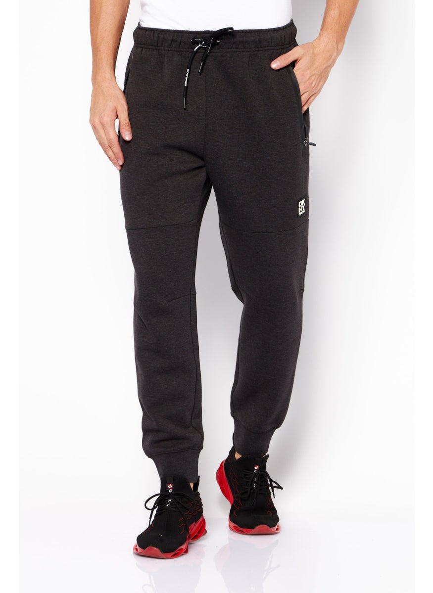 DKNY Sport Men Sportswear Fit Brand Logo Training Jogger Pant, Dark Heather Grey  - Image 1