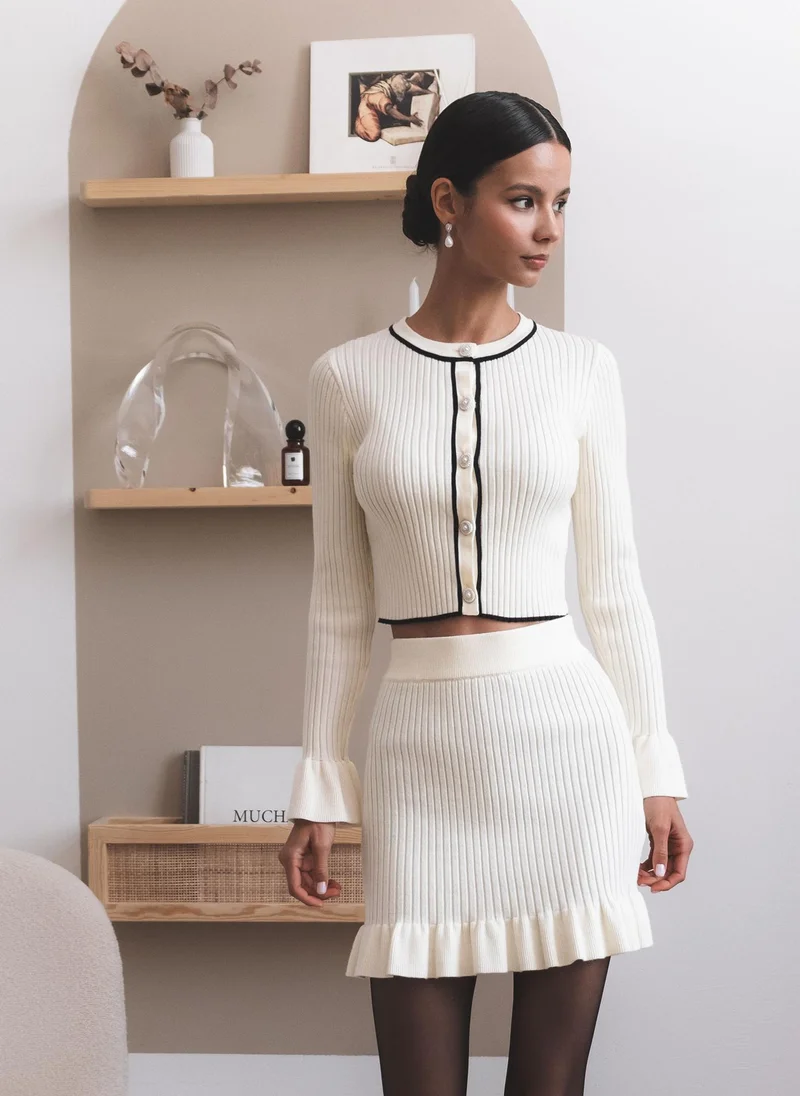 Lichi Mini rib-knit skirt with flounce at bottom edge