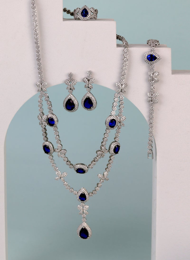 إكسسوارات آر. سي. إي طقم من  من حجر الزركونيا الأزرق الملكي - تتضمن قلادة وسوارًا وأقراطًا وخاتم - Image 1