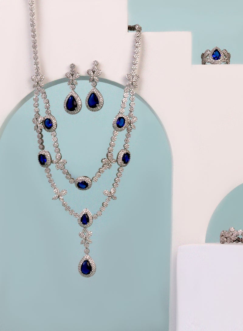 إكسسوارات آر. سي. إي طقم من  من حجر الزركونيا الأزرق الملكي - تتضمن قلادة وسوارًا وأقراطًا وخاتم - Image 2