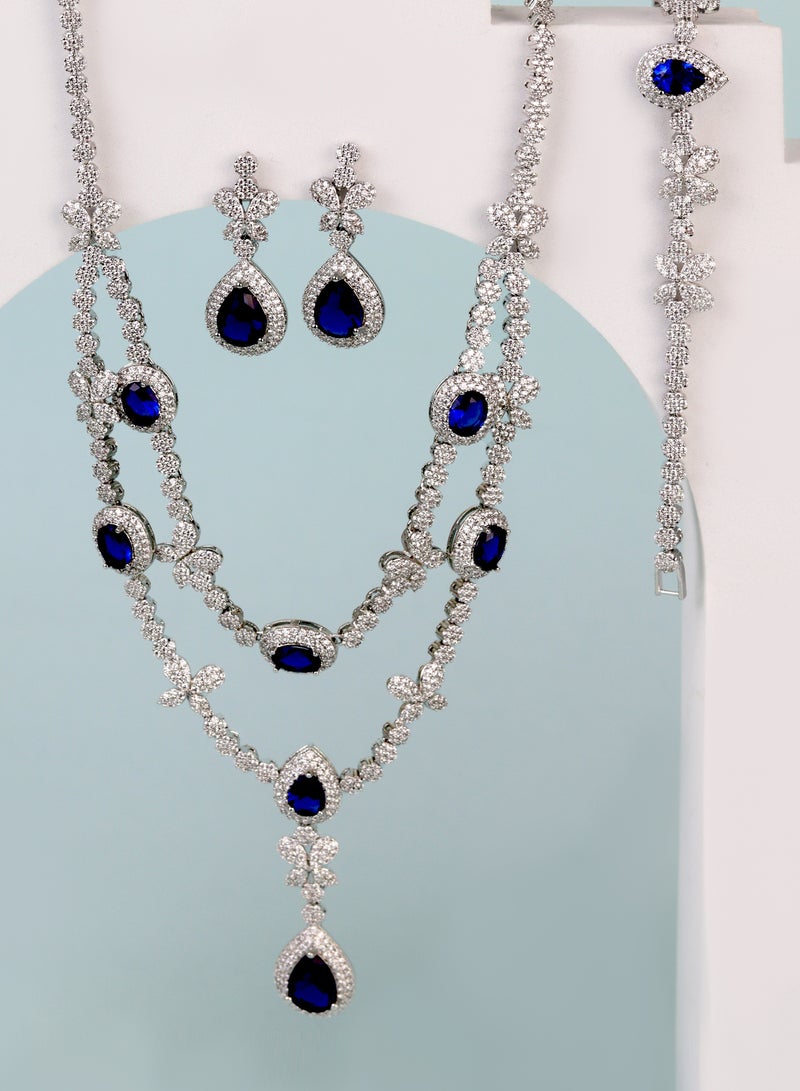 إكسسوارات آر. سي. إي طقم من  من حجر الزركونيا الأزرق الملكي - تتضمن قلادة وسوارًا وأقراطًا وخاتم - Image 3