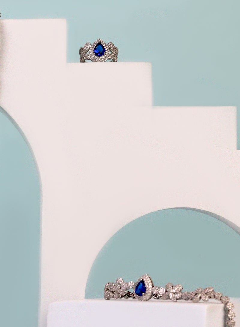 إكسسوارات آر. سي. إي طقم من  من حجر الزركونيا الأزرق الملكي - تتضمن قلادة وسوارًا وأقراطًا وخاتم - Image 4