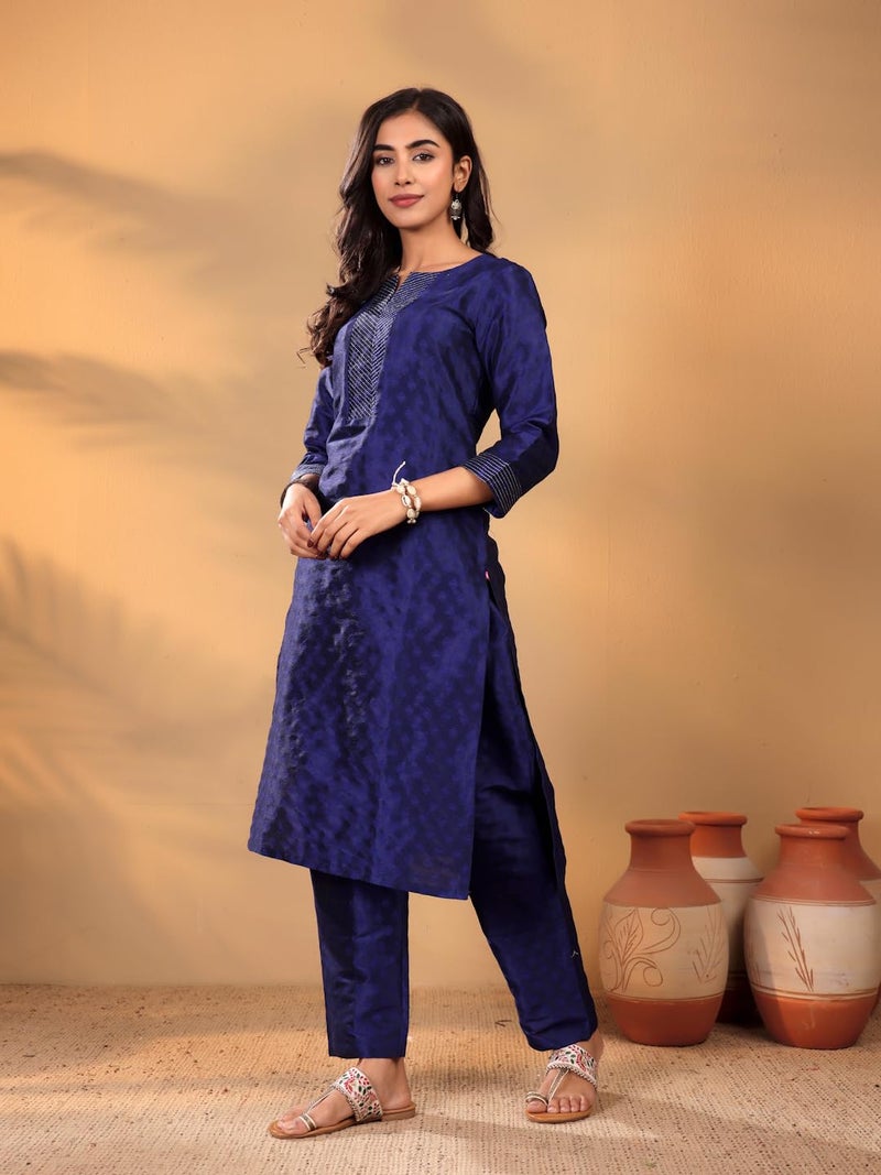 Varanga Women woven straight fit navy blue kurta with dobby texture and zari couching, styled with matching trousers and a floral printed dupatta. - Image 3
