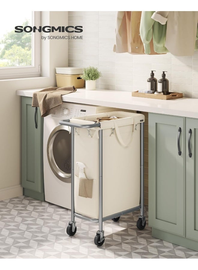 SONGMICS سلة غسيل SONGMICS بعجلات، سلة غسيل متحركة، 23.8 جالون (90 لتر)، بطانة قابلة للإزالة، إطار فولاذي مع مقبض، تخزين البطانيات، 24 × 11.4 × 31.9 بوصة، أبيض كريمي - Image 2