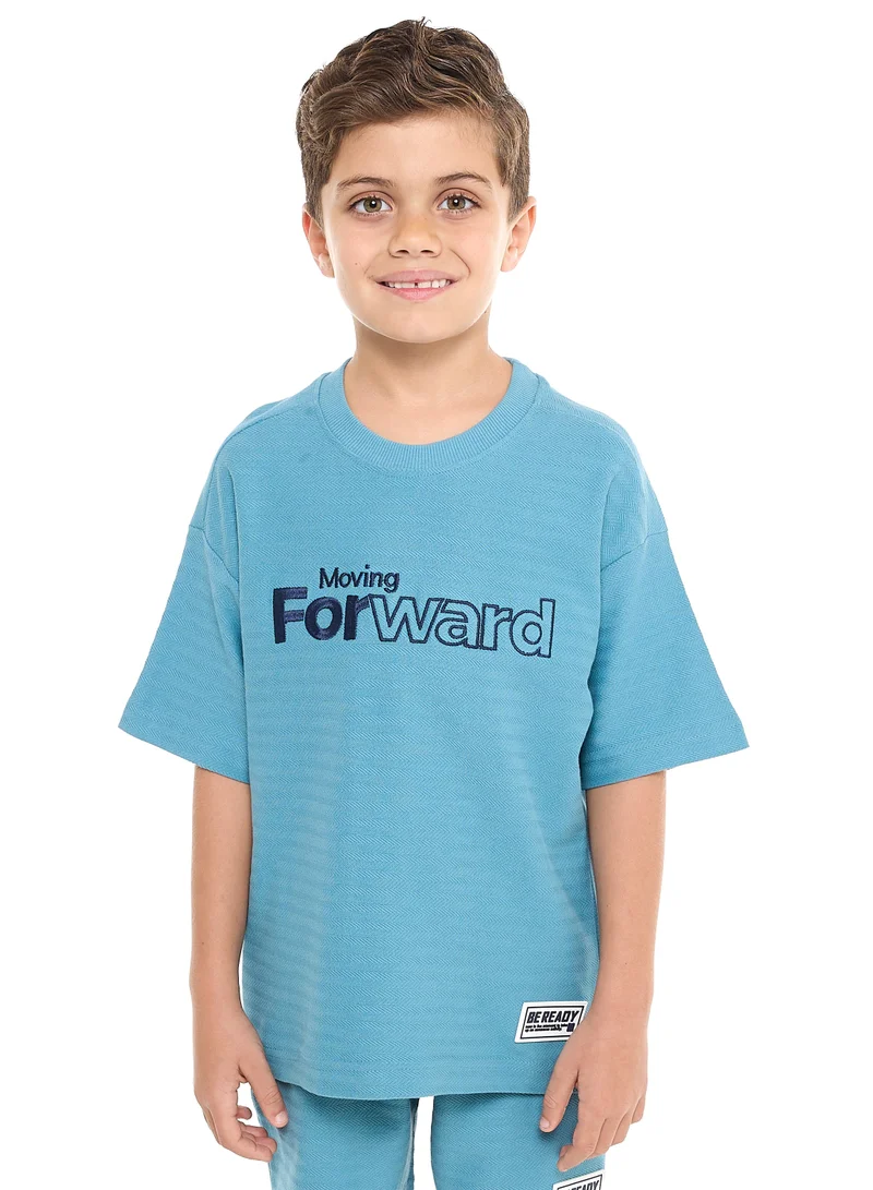 victor and jane Oversized - Boys' Jacquard 2-Piece Set - Slogan Embroidered T-Shirt with Badge Detail and matching Shorts with Pockets,
