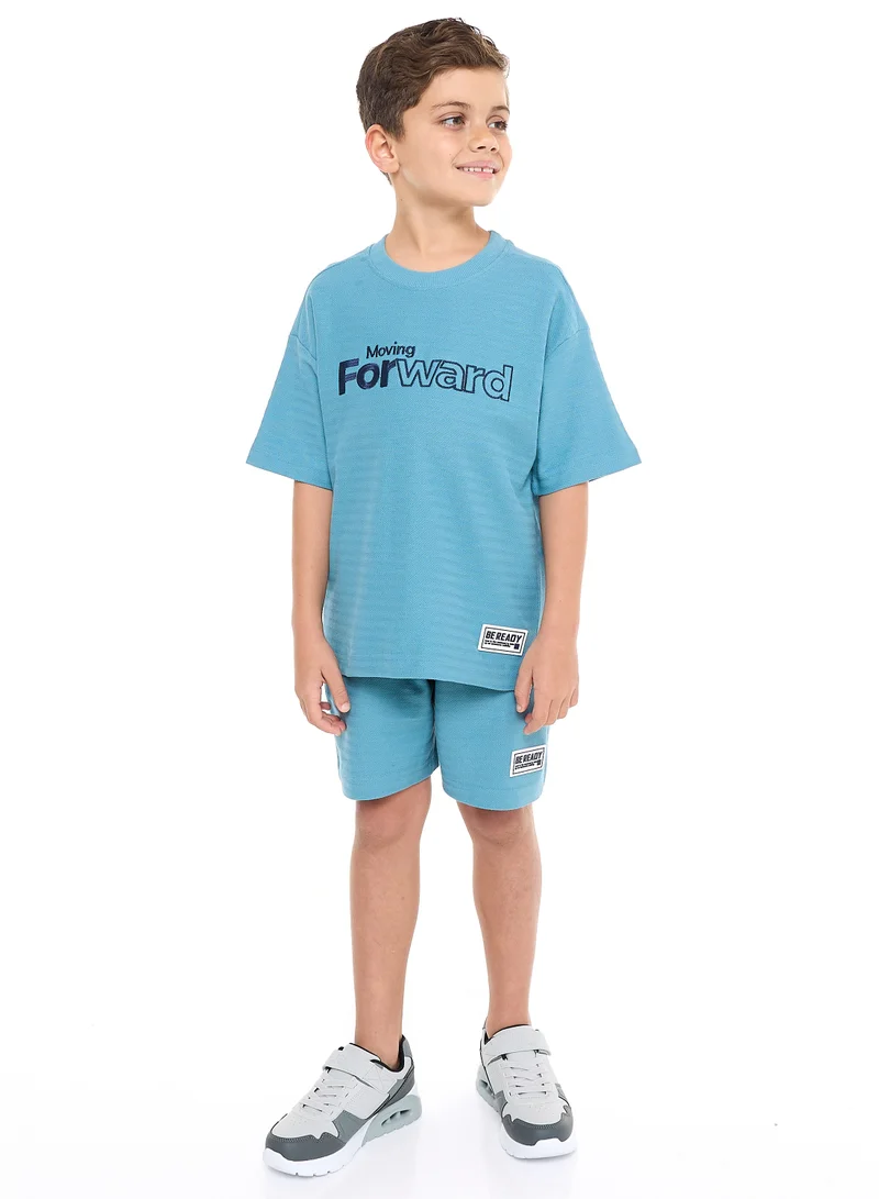 victor and jane Oversized - Boys' Jacquard 2-Piece Set - Slogan Embroidered T-Shirt with Badge Detail and matching Shorts with Pockets,