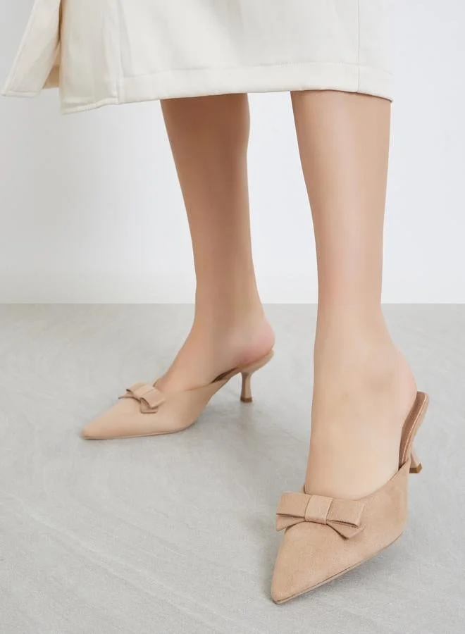 ستايلي حذاء ميولز مزين بفيونكة