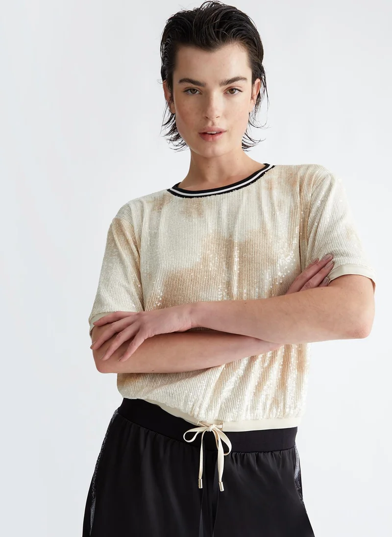 ليو جو سويت شيرت مزين بالترتر