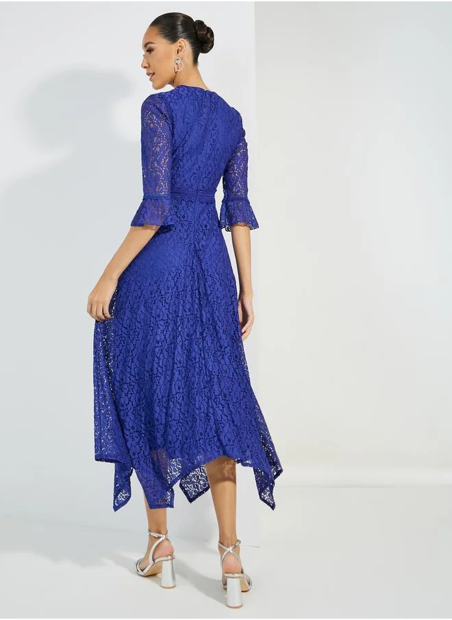Styli Lace Detail High Neck Asymmetric Hem Midi Dress