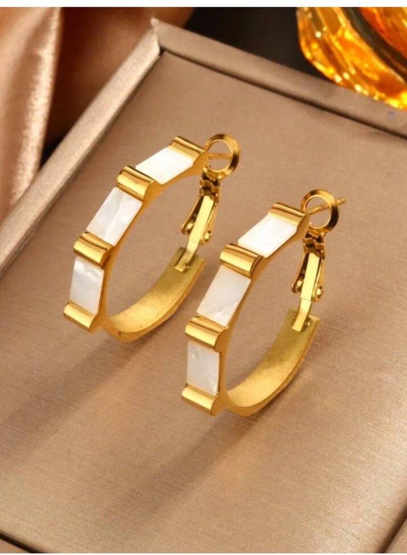 دانجل تشارمز حلق اذن نسائي أنيق وعصري مصنوع من الاستانلس ستيل عالي الجودة - Image 1