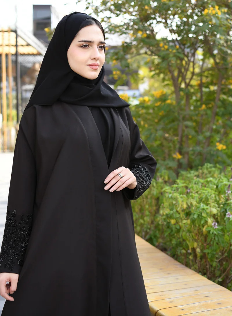 عبايات حوراء عباية لف سوداء بشك أسود يدوي على الأكمام