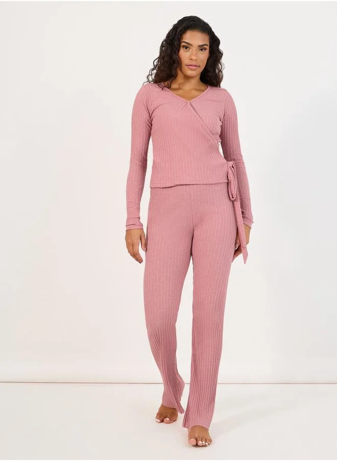 Styli Brushed Rib Wrap Tie Top & Flared Trouser Lounge Set