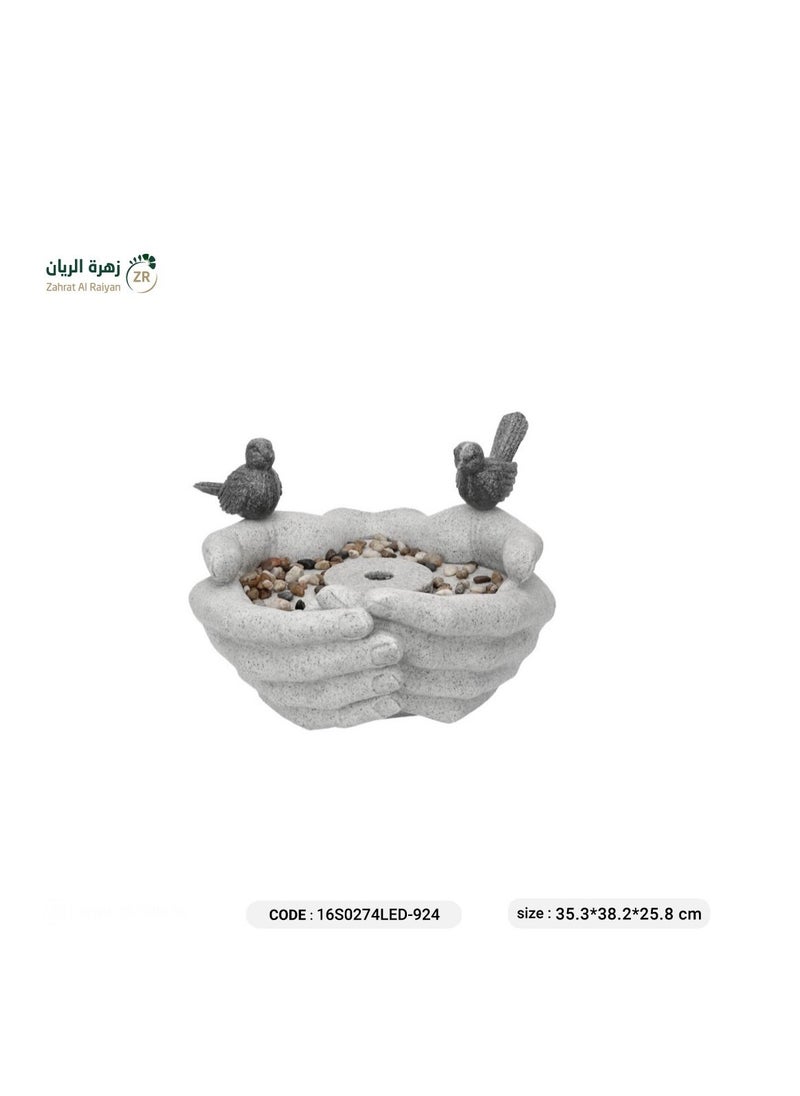 Zahrat Al Raiyan Hand shaped fountain in grey color  - Image 1