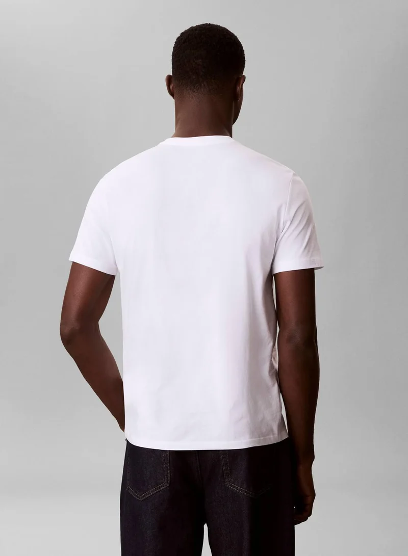 Calvin Klein Jeans Bright White Logo Graphic Crew Neck T-Shirt for Men | Best Price UAE