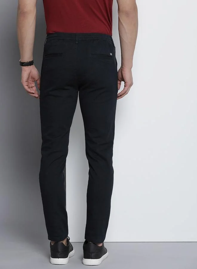The Indian Garage Co Navy Blue Men Navy Blue Slim Fit Solid Chinos for Men | Best Price UAE