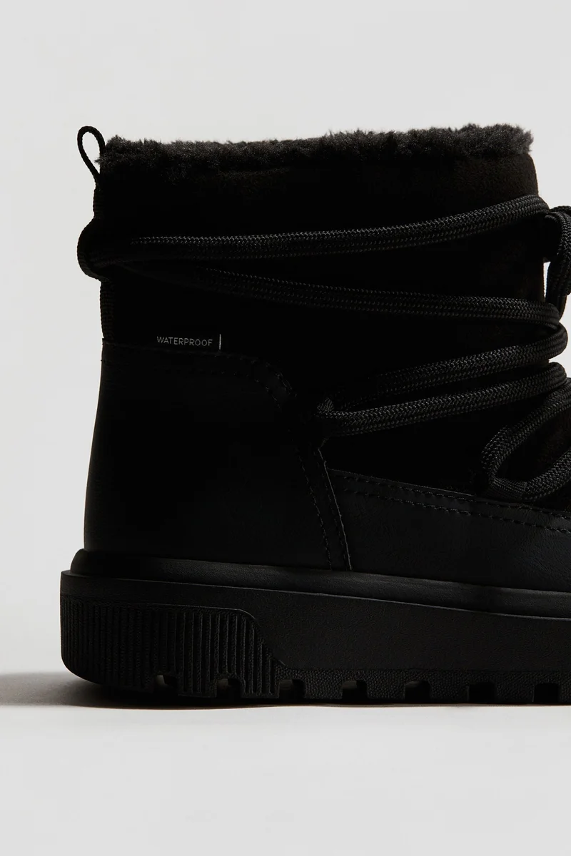 اتش اند ام بووت للثلج ببطانة ناعمة ودافئة