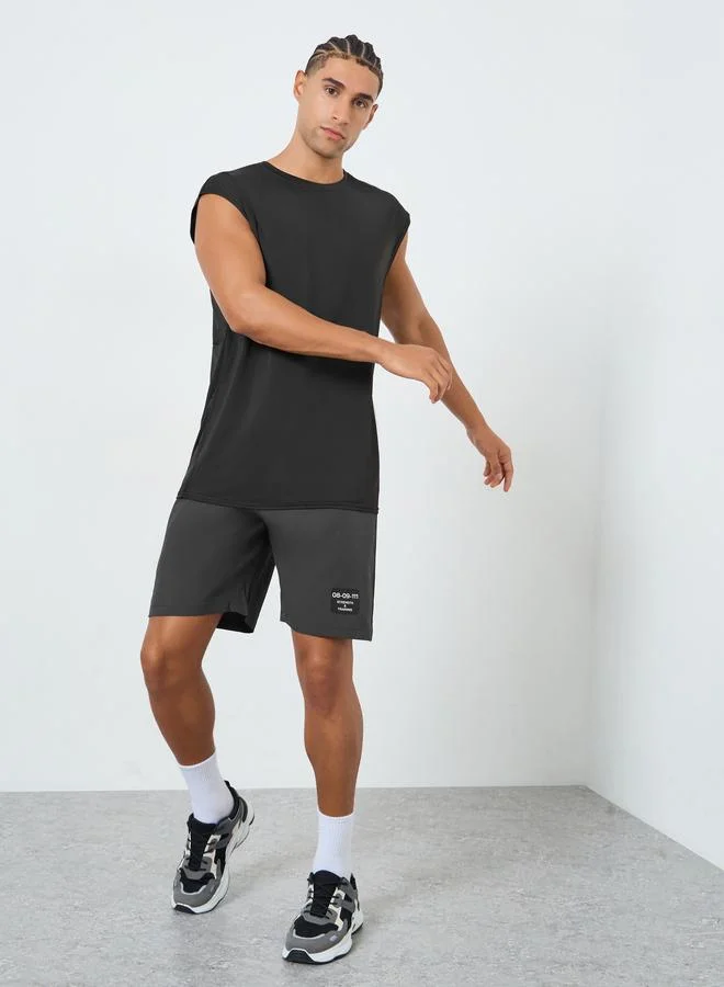 ستايلي اكتيف تانك رياضي بقصة عادية سريع الجفاف مع لوحات شبكية