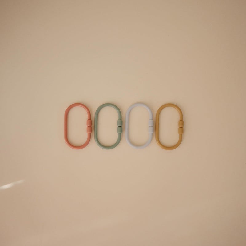 mushie Baby Chain Link Rings Toy 12-Count | Multiuse Car Seat Stroller Connecting Toy (Periwinkle, Mustard, Green, Coral) - Image 2