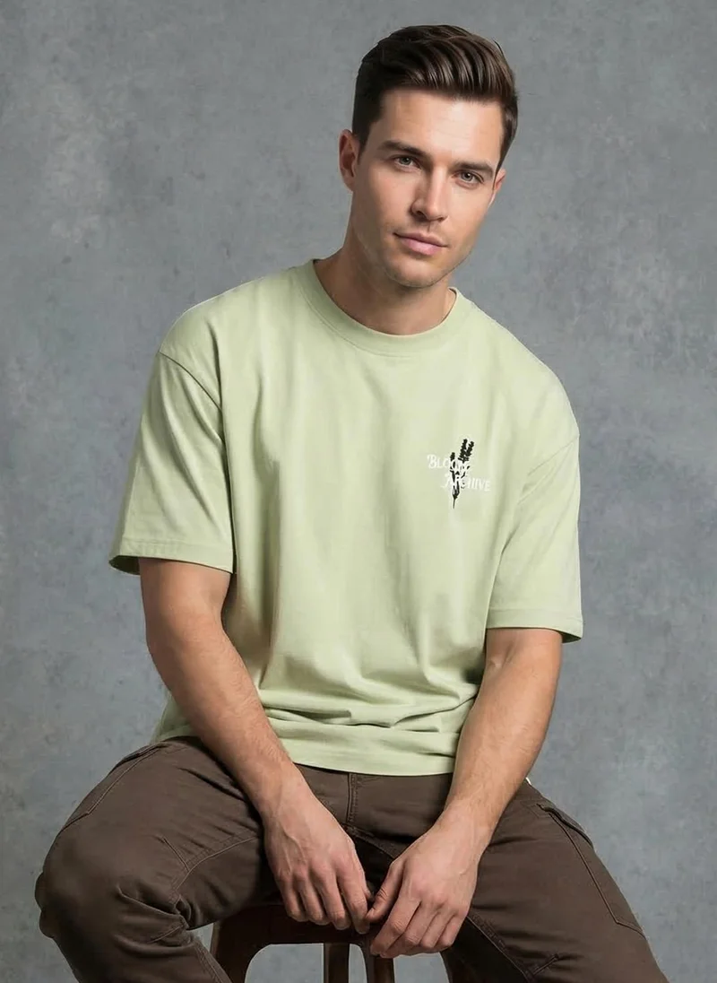 نوبيرو Men Oversized Printed T-shirt