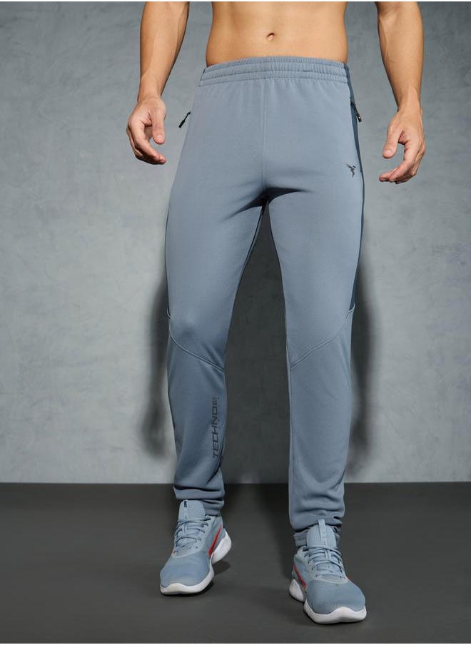 Technosport Men Solid Slim Fit Track Pants with TECHNO DRY by Styli  - Image 1