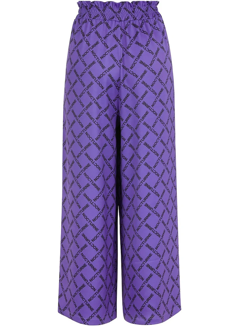 نوكتورن High Waist Wide Leg Logo Pants