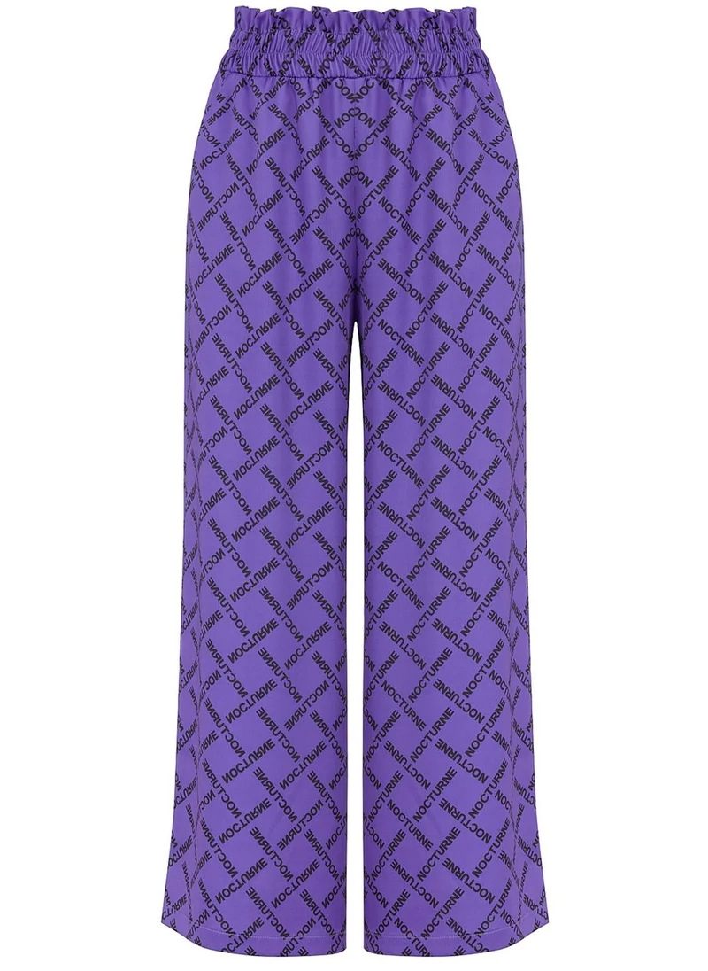 نوكتورن High Waist Wide Leg Logo Pants
