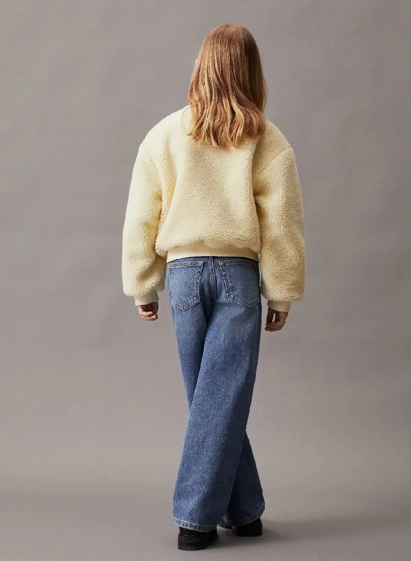 كالفن كلاين جينز جاكيت بومبر تيدي قابل للارتداء على الوجهين