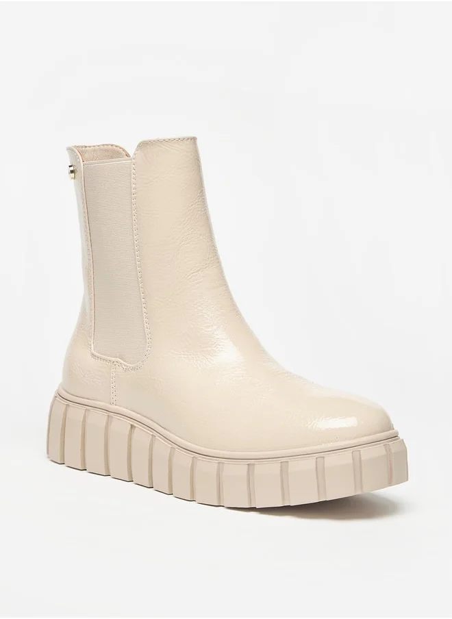 Celeste Women's Solid Slip-On Flatform Boots