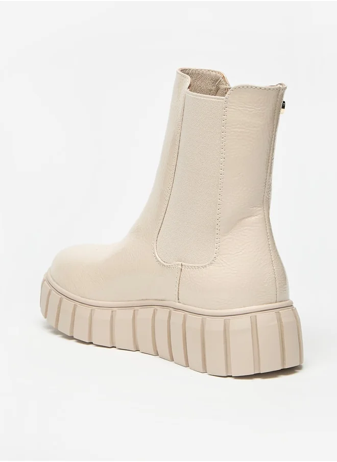 Celeste Women's Solid Slip-On Flatform Boots