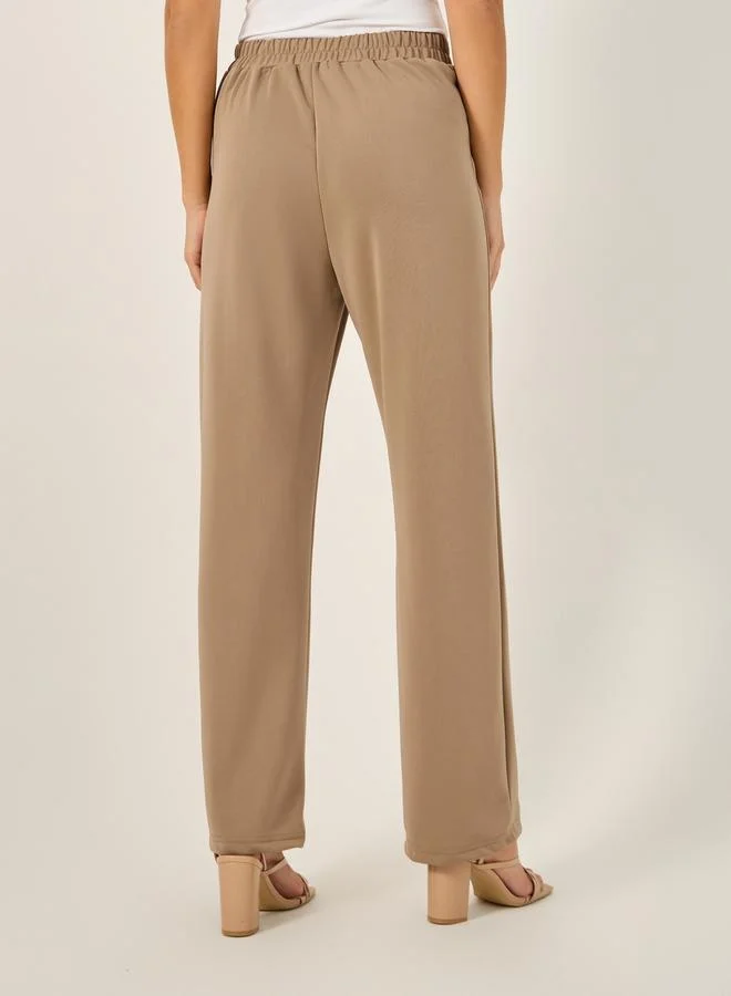 Styli Tapered Knit Pants with Elastic Waistband