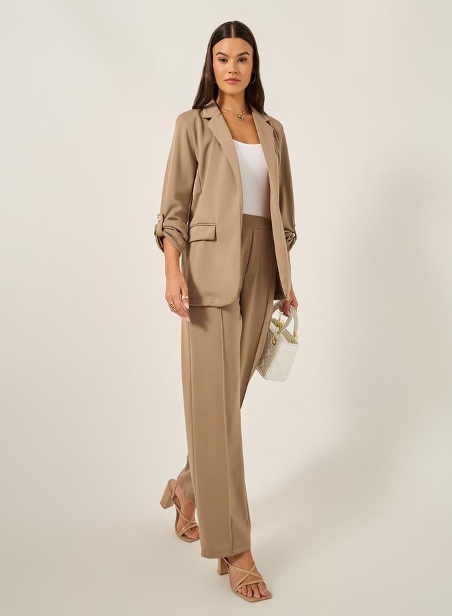 Styli Tapered Knit Pants with Elastic Waistband - Image 1