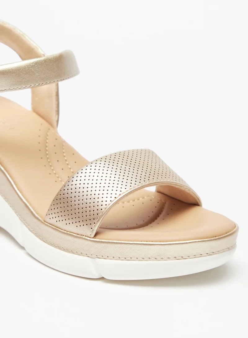 Le Confort Textured Sandals With Buckle Closure And Wedge Heels