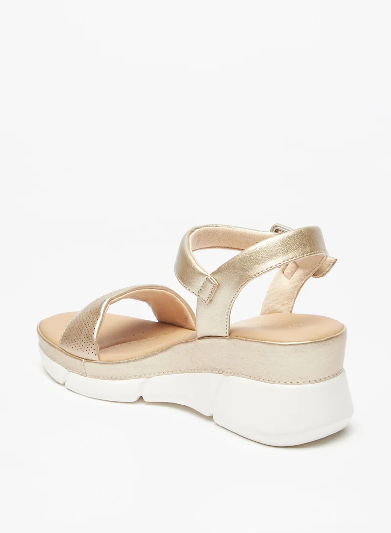 Le Confort Textured Sandals With Buckle Closure And Wedge Heels