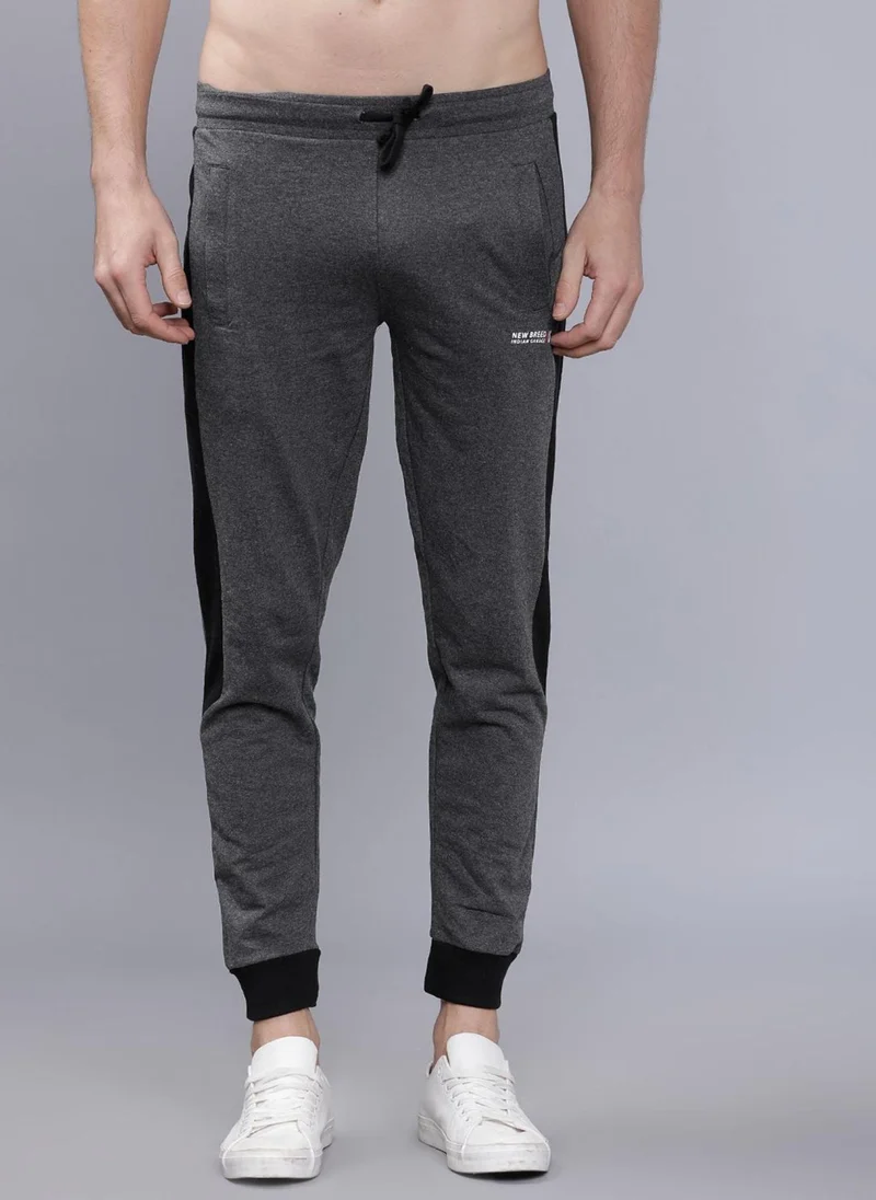 The Indian Garage Co Men Slim Fit Solid Mid-Rise Stretchable Knitted Jogger Trousers
